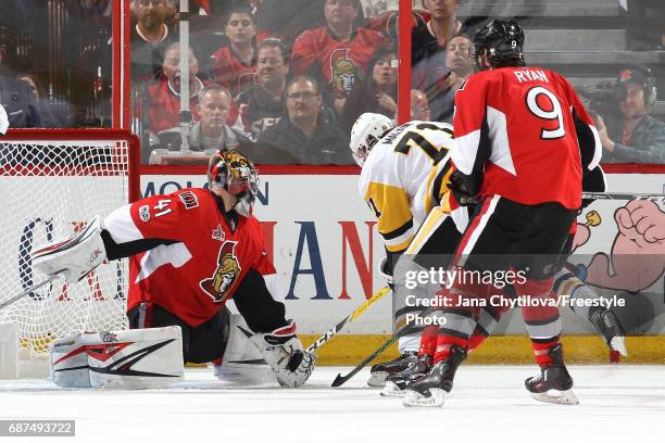 Evgeni Malkin of the Pittsburgh Penguins scores a goal on Craig Anderson of the Ottawa Senators during the second period in Game Six of the Eastern...