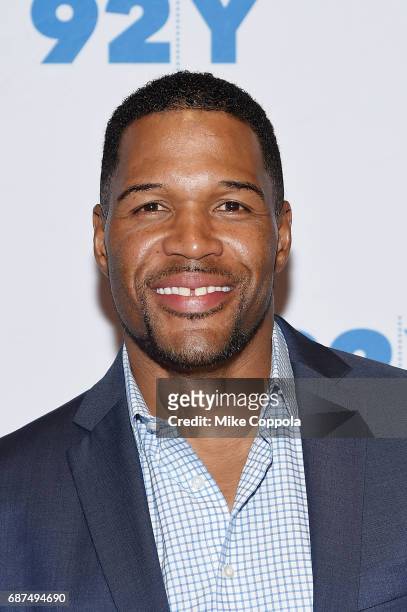 Former Professional Football player/television personality Michael Strahan poses for a photo at 92nd Street Y Presents Jamie Foxx In Conversation...