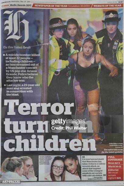 New Zealand newspapers covering the Manchester bombing are pictured on May 23, 2017 in Auckland, New Zealand. An explosion occurred at Manchester...