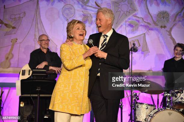 Former United States Secretary of State Hillary Clinton and President Bill Clinton speak onstage during the SeriousFun Children's Network Gala at...