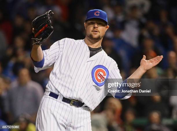 Jon Lester of the Chicago Cubs celebrates a complete game win against the San Francisco Giants at Wrigley Field on May 23, 2017 in Chicago, Illinois....