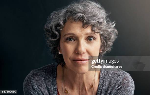 age is a privilege - woman black background stock pictures, royalty-free photos & images