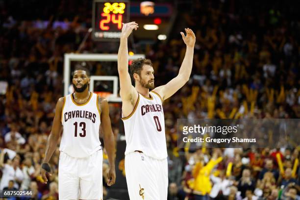Kevin Love and Tristan Thompson of the Cleveland Cavaliers react in the third quarter against the Boston Celtics during Game Four of the 2017 NBA...