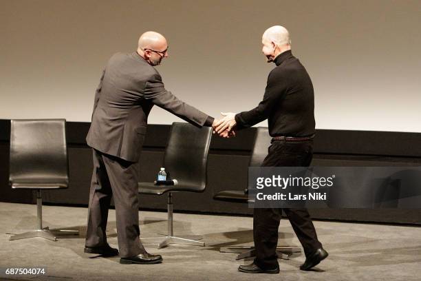 Moderator Joe Neumaier shakes hands with Re-recording Mixer Lee Dichter during the Academy of Motion Picture Arts and Sciences Presentation "We'll...