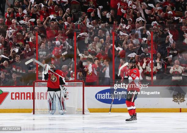 Mike Hoffman of the Ottawa Senators celebrates after scoring on the Pittsburgh Penguins with teammate Craig Anderson looking on in Game Six of the...