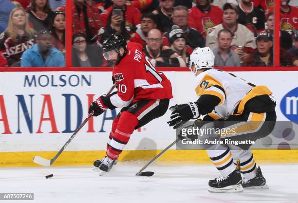 Tom Pyatt of the Ottawa Senators stickhandles the puck away from Olli Maatta of the Pittsburgh Penguins in Game Six of the Eastern Conference Final...