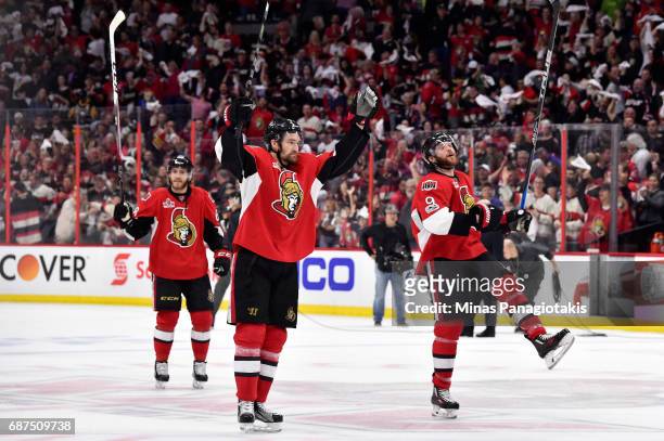 Chris Wideman and Bobby Ryan of the Ottawa Senators celebrate after defeating the Pittsburgh Penguins with a score of 2 to 1 in Game Six of the...