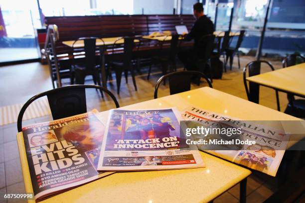 Newspapers are seen with headlines and stories covering the Manchester Bombing on May 24, 2017 in Melbourne, Australia. An explosion occurred at...