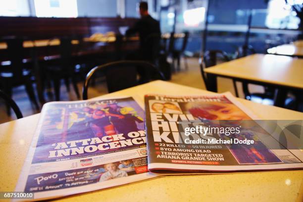 Newspapers are seen with headlines and stories covering the Manchester Bombing on May 24, 2017 in Melbourne, Australia. An explosion occurred at...