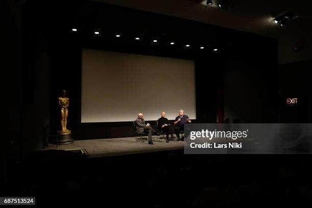 Moderator Joe Neumaier and Re-recording mixers Lee Dichter and Tom Fleischman on stage during the Academy of Motion Picture Arts and Sciences...