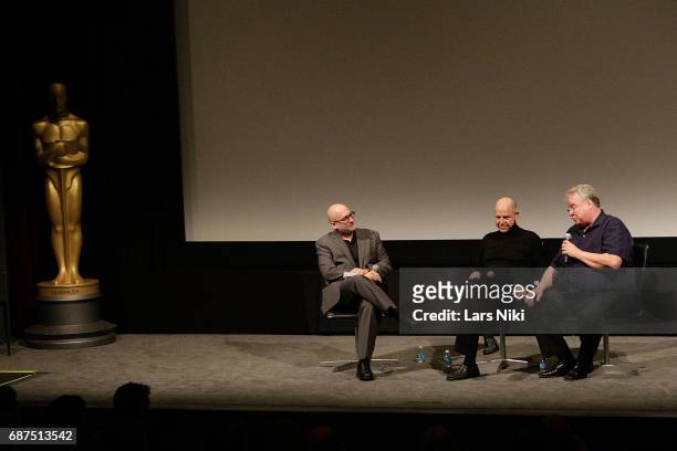 Moderator Joe Neumaier and Re-recording mixers Lee Dichter and Tom Fleischman on stage during the Academy of Motion Picture Arts and Sciences...
