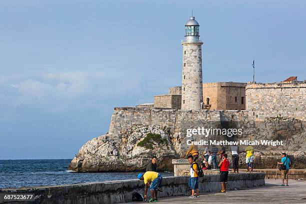 morro castle protectin the havana harbor. - morro castle havana imagens e fotografias de stock