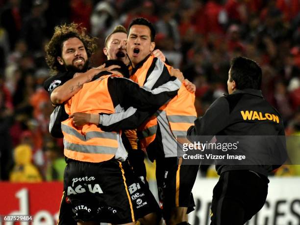 Players of The Strongest celebrate their qualification after a match between Independiente Santa Fe and The Strongest as part of Copa CONMEBOL...