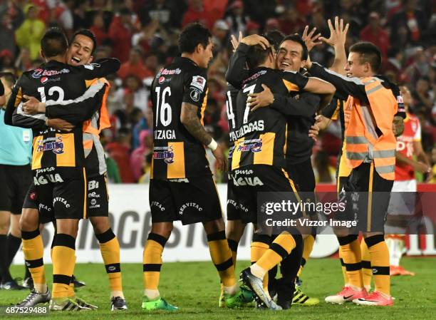 Players of The Strongest celebrate their qualification after a match between Independiente Santa Fe and The Strongest as part of Copa CONMEBOL...