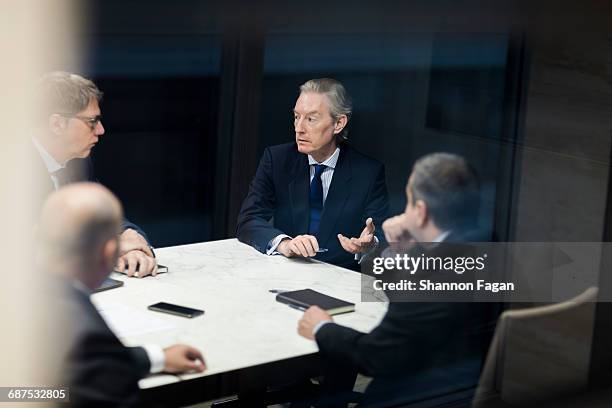 businessmen talking together in office meeting - board room 個照片及圖片檔