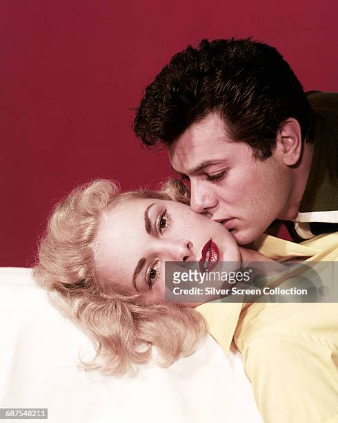 Married American actors Tony Curtis and Janet Leigh , circa 1955.