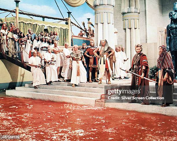 Actors Charlton Heston as Moses and Yul Brynner as Pharaoh Rameses II of Egypt in the biblical epic 'The Ten Commandments', 1956. Here Moses turns...