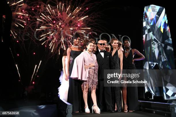 Fawaz Gruosi and models during the DeGrisogono "Love On The Rocks" gala during the 70th annual Cannes Film Festival at Hotel du Cap-Eden-Roc on May...