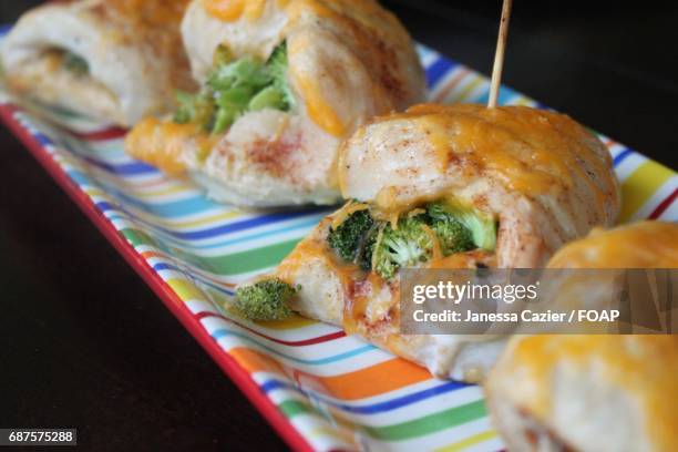 stuffed chicken with broccoli - janessa stockfoto's en -beelden