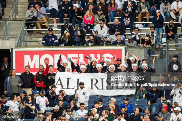 General view of fans in the right field bleachers holding up an All Rise sign directed at Aaron Judge of the New York Yankees during the game against...