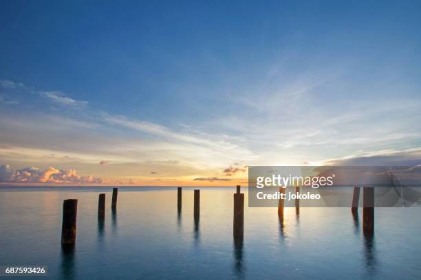 sunset at the beach - jakarta stock pictures, royalty-free photos & images