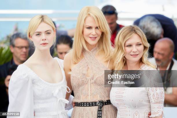 Actors Elle Fanning, Nicole Kidman, Kirsten Dunst attend the "The Beguiled" photocall during the 70th annual Cannes Film Festival at Palais des...