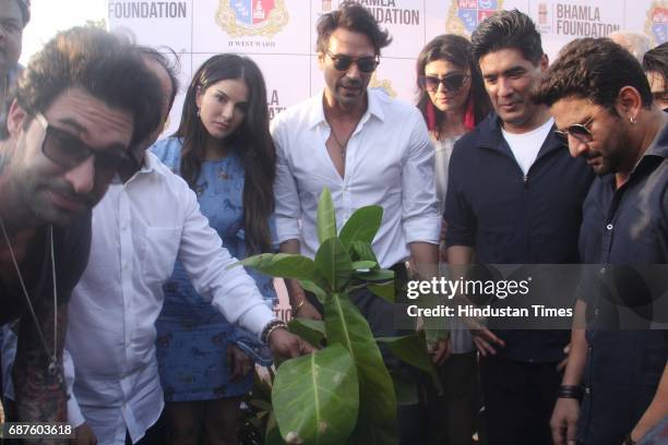 Bollywood actors Sunny Leone, Arjun Rampal, Pooja Batra, designer Manish Malhotra and Arshad Warsi during the grand tree plantation drive where over...