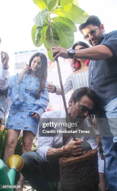 Bollywood actors Sunny Leone, Arjun Rampal, and Arshad Warsi during the grand tree plantation drive where over 500 plants would be planted at Joggers...