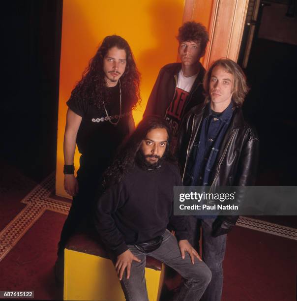 Group portrait of members of the Rock band Soundgarden as they pose at the Vic Theater, Chicago, Illinois, November 8, 1991. Pictured are, standing...