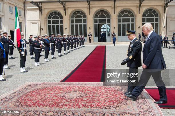 In this handout image provided by Ufficio Stampa e Comunicazione della Presidenza della Repubblica, US President Donald Trump arrives at Palazzo del...