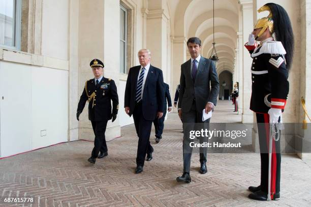 In this handout image provided by Ufficio Stampa e Comunicazione della Presidenza della Repubblica, US President Donald Trump arrives at Palazzo del...