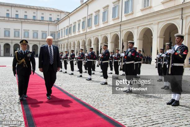 In this handout image provided by Ufficio Stampa e Comunicazione della Presidenza della Repubblica, US President Donald Trump arrives at Palazzo del...