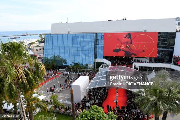 General view taken on May 23, 2017 shows guests arriving at the Festival Palace for the '70th Anniversary' ceremony of the Cannes Film Festival in...