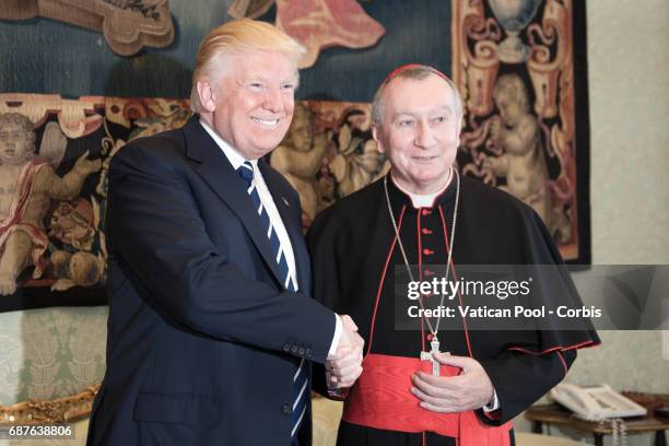 President of United States of America Donald Trump talks with Vatican State Secretary Pietro Parolin after a meeting with Pope Francis, on May 22,...