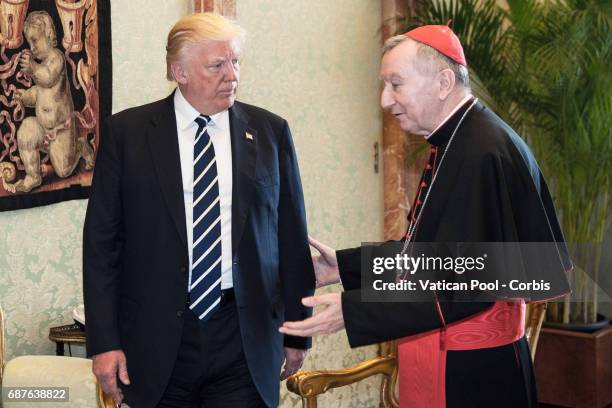 President of United States of America Donald Trump talks with Vatican State Secretary Pietro Parolin after a meeting with Pope Francis, on May 22,...