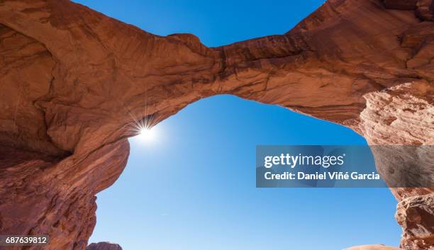 double arch at arches national park - navajo sandstone formations stock pictures, royalty-free photos & images