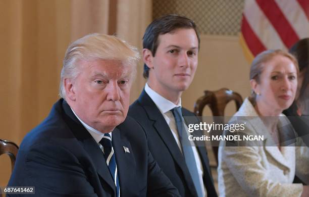 President Donald Trump and White House senior advisor Jared Kushner take part in a bilateral meeting with Italy's Prime Minister Paolo Gentiloni in...