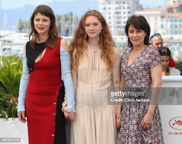 Barbora Bobulova, Charlotte Cetaire and Marilyne Canto attends the "Dopo La Guerra - Apres La Guerre" photocall during the 70th annual Cannes Film...