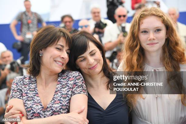 French actress Marilyne Canto, Italian director Annarita Zambrano and French actress Charlotte Cetaire pose on May 24, 2017 during a photocall for...