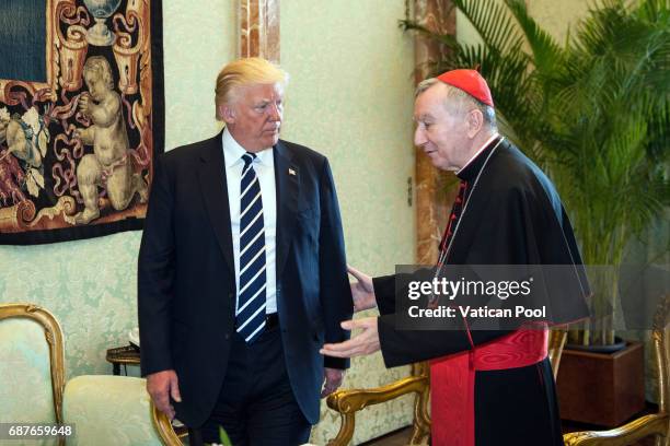 Vatican Secretary of State cardinal Pietro Parolin meets United States President Donald Trump at the Apostolic Palace on May 24, 2017 in Vatican...