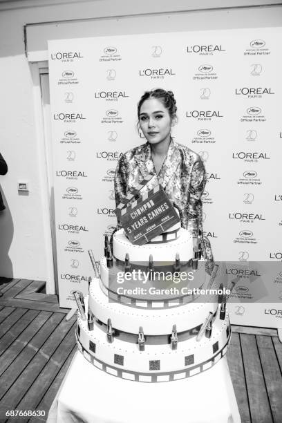 Chompoo Araya celebrates her 5th year anniversary with L'Oreal during the Cannes film festival on May 21, 2017 in Cannes, France.