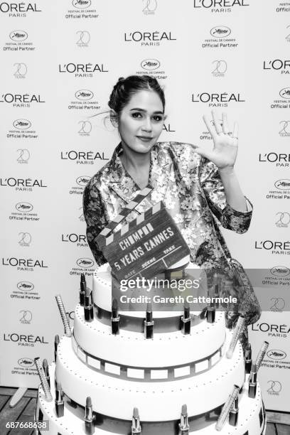 Chompoo Araya celebrates her 5th year anniversary with L'Oreal during the Cannes film festival on May 21, 2017 in Cannes, France.