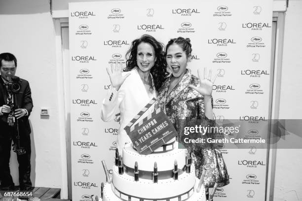 Chompoo Araya is photographed with Andie MacDowell during the celebration her 5th year anniversary with L'Oreal during the Cannes film festival on...