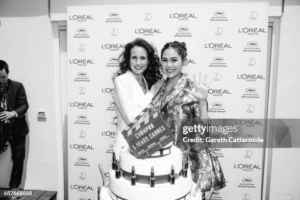 Chompoo Araya is photographed with Andie MacDowell during the celebration her 5th year anniversary with L'Oreal during the Cannes film festival on...