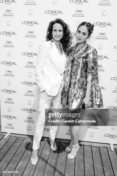 Chompoo Araya photographed with Andie MacDowell at the L'Oreal Terrace during the Cannes film festival on May 21, 2017 in Cannes, France.