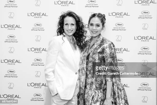 Chompoo Araya photographed with Andie MacDowell at the L'Oreal Terrace during the Cannes film festival on May 21, 2017 in Cannes, France.