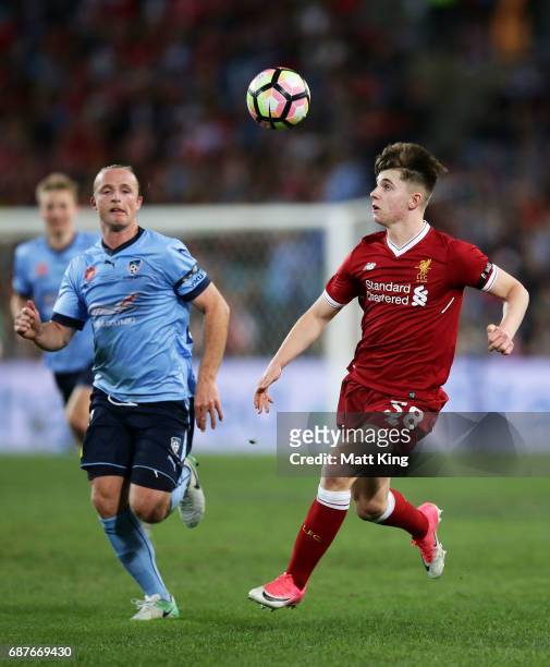 Ben Woodburn of Liverpool is challenged by Rhyan Grant of Sydney FC during the International Friendly match between Sydney FC and Liverpool FC at ANZ...