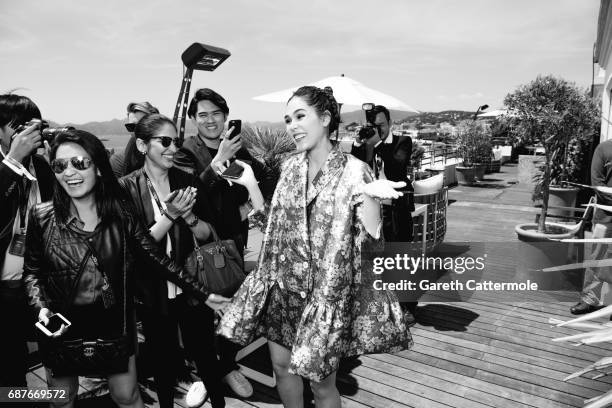 Chompoo Araya is photographed at the L'Oreal Terrace during the Cannes film festival on May 21, 2017 in Cannes, France.