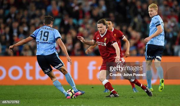 Steve McManaman of Liverpool competes with George Blackwood of Sydney FC during the International Friendly match between Sydney FC and Liverpool FC...