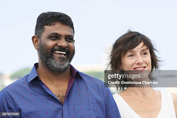 Artem Tsypin and Olga Dragunova attend the "Tesnota - Une Vie A L'Etroit" photocall during the 70th annual Cannes Film Festival at Palais des...